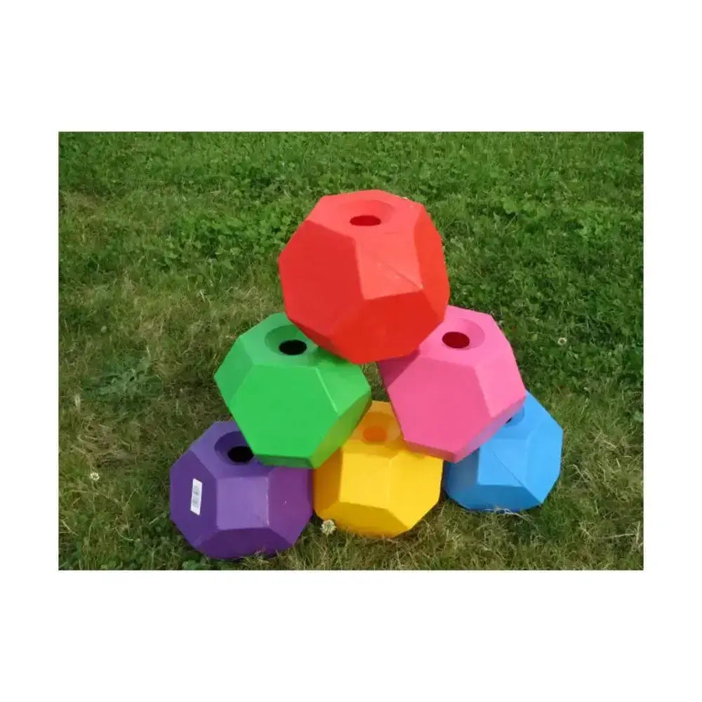 A stack of colorful foam dumbbells in red green pink purple yellow and blue for parallax snack multi sided feeding