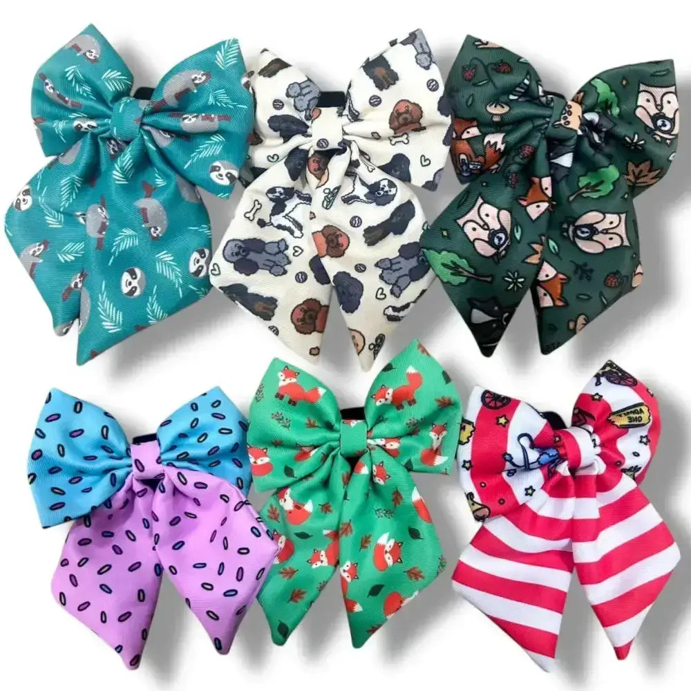 Peacock power sailor bows with secure elastic loops featuring bold beautiful colorful cartoon animal patterns in teal and pink