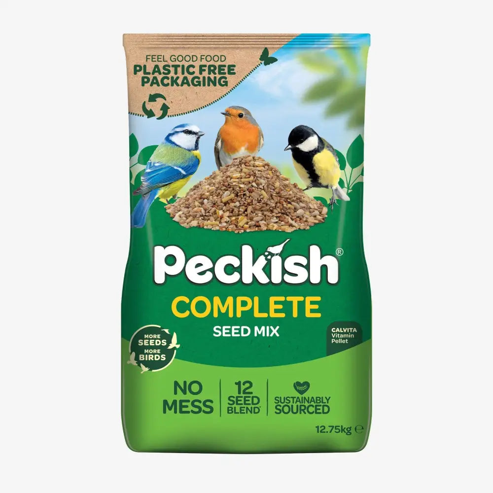 Peckish complete seed mix in a green and brown plastic free bag with calvita vitamin and naked oats features three birds
