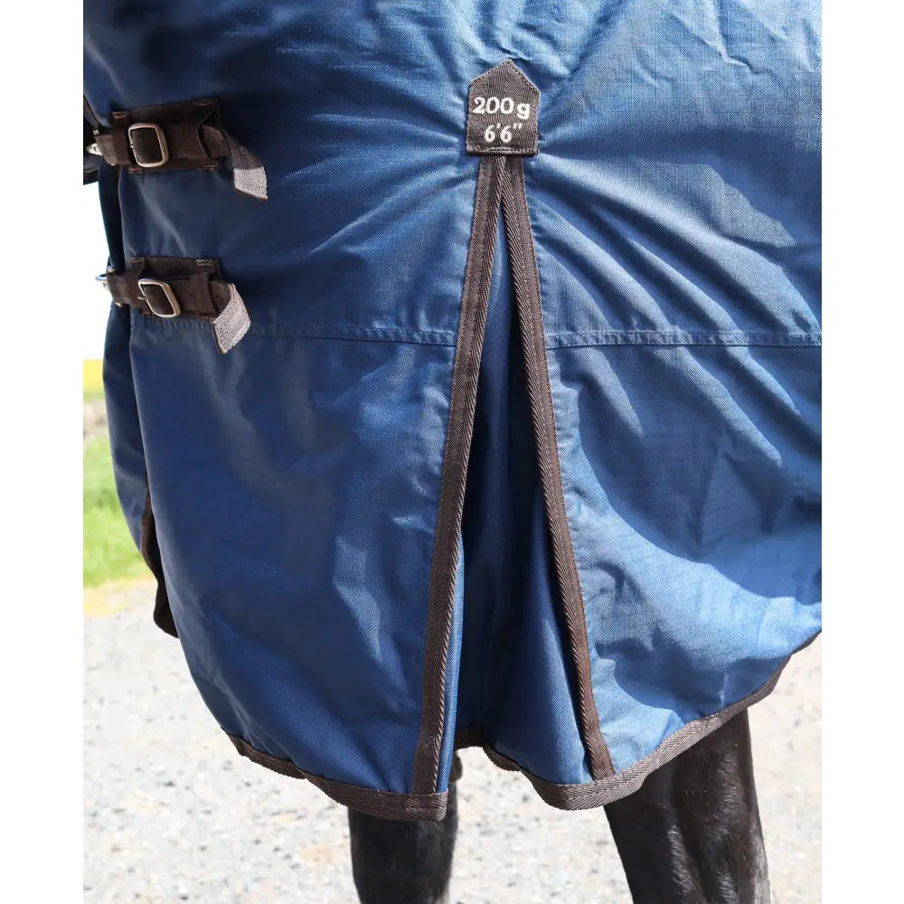Blue horse turnout rug with brown leather straps perf standard 200g medium weight 66 inch length label visible