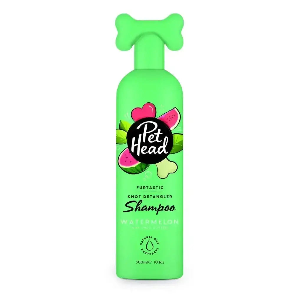 Bright green pet head furtastic shampoo bottle with bone-shaped pump for tackling stubborn knots