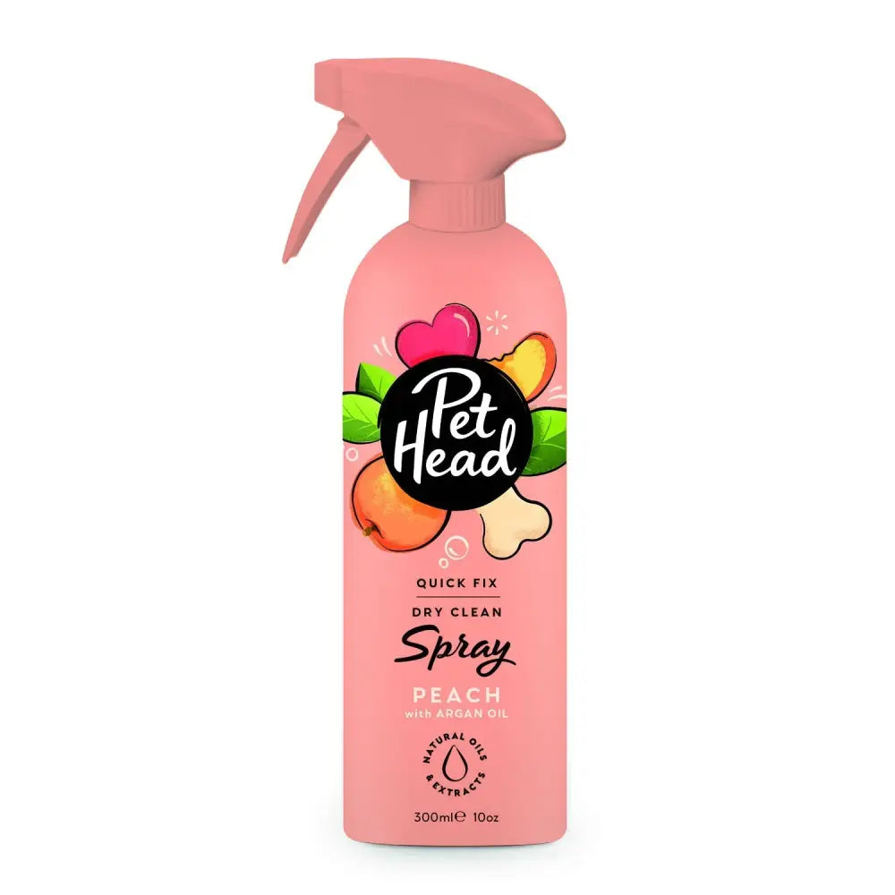 Pet head quick fix spray in peach scent with argan oil features a playful label and matching pink spray nozzle for peachy clean pets