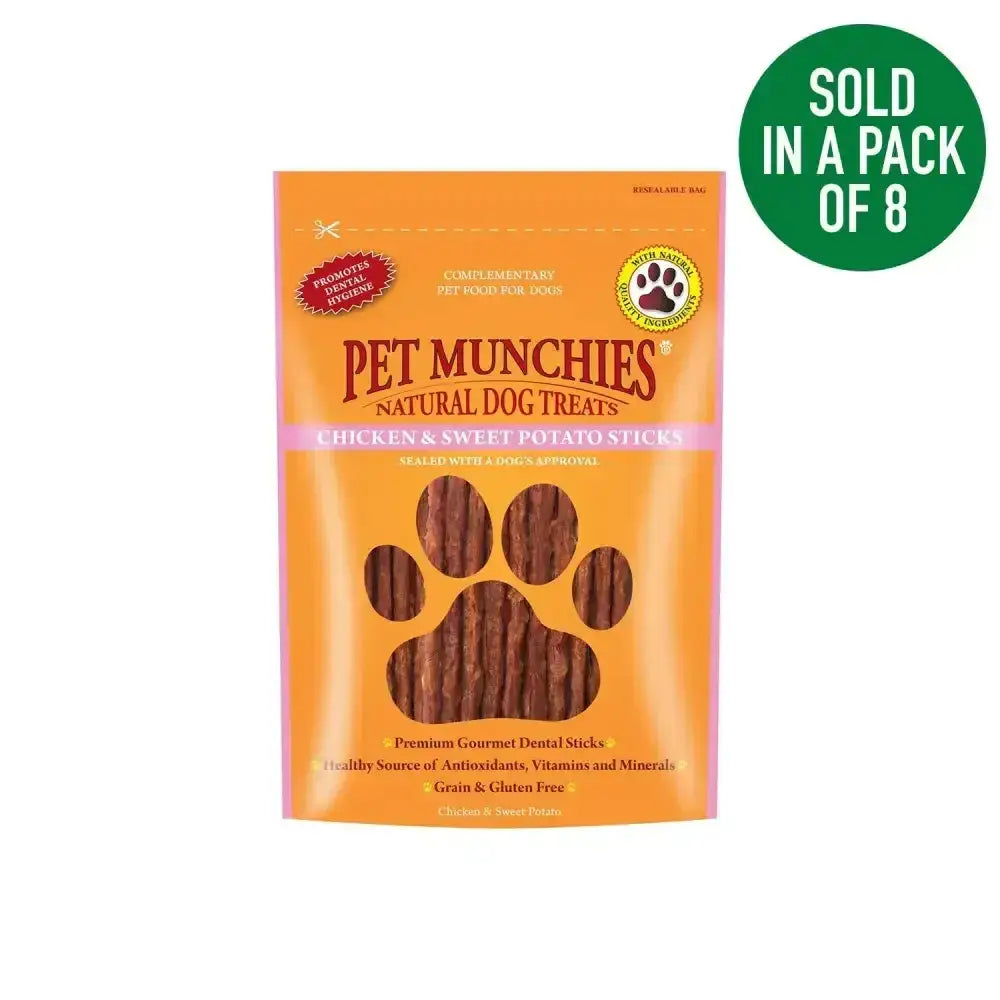 Orange pet munchies chicken package with natural sweet potato sticks dog treats and paw print window design