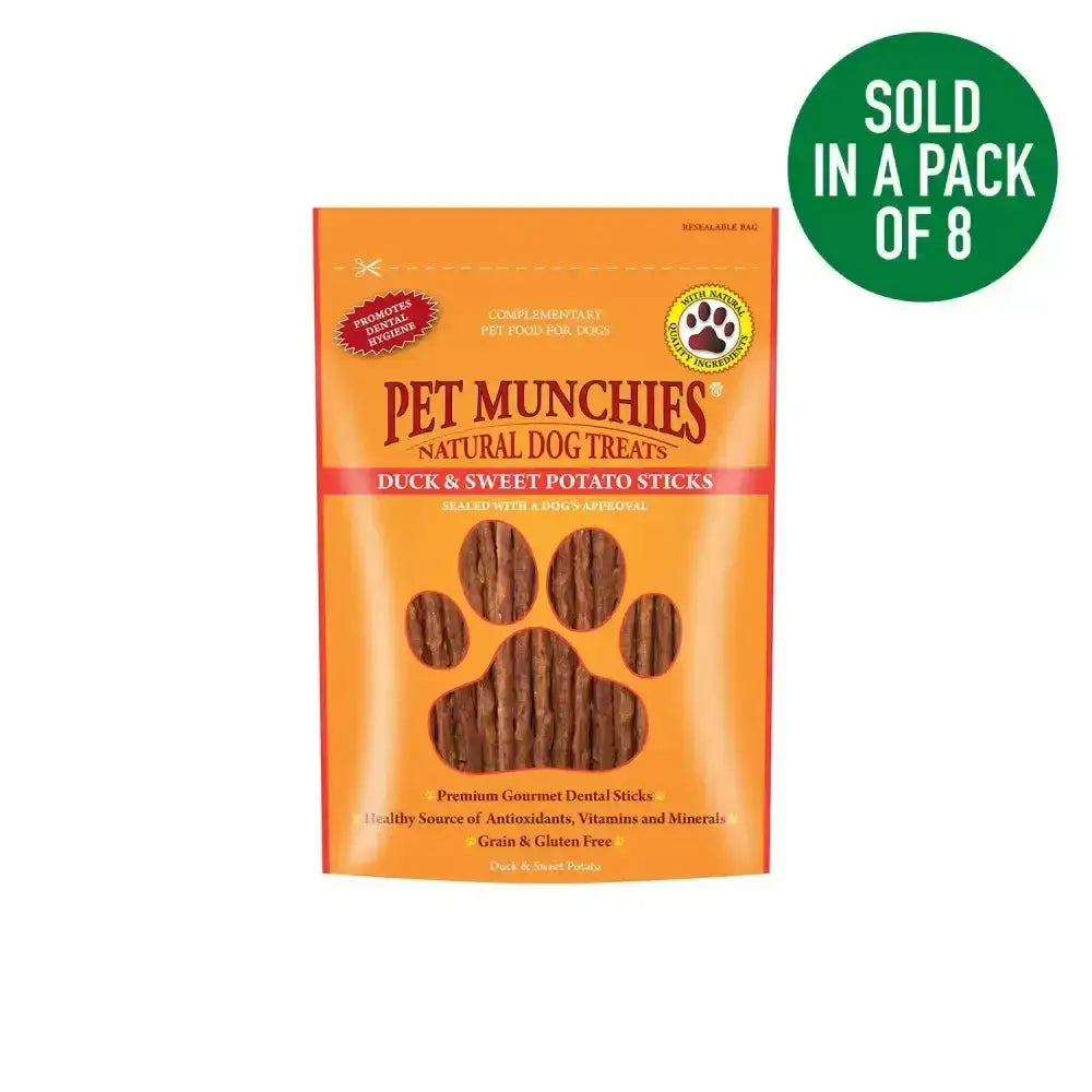 Orange package of pet munchies duck natural dog treats with sweet potato sticks shaped like a paw print