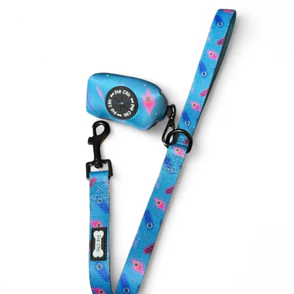 Blue power peacock poo bag holder with pink purple feather leash and matching pup chic dispenser for easy clean-ups