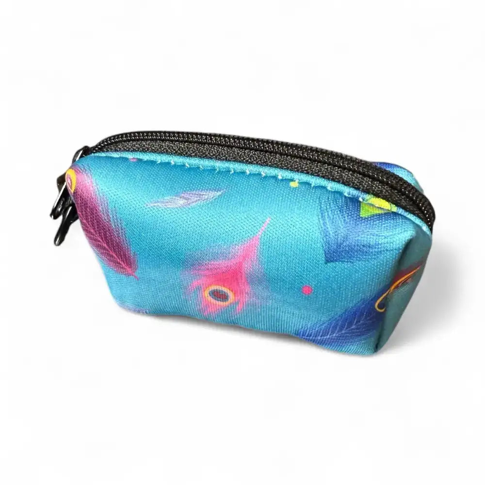 A turquoise power peacock poo bag holder with colorful peacock feather patterns and a black zipper for easy clean-ups