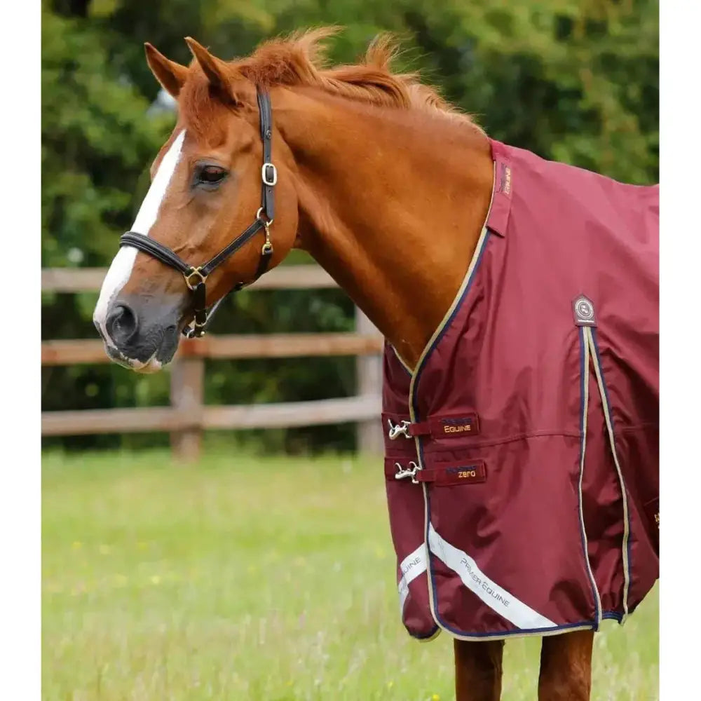 Maroon premier equine buster zero turnout rug in denier ballistic nylon with white and navy trim and classic neck cover