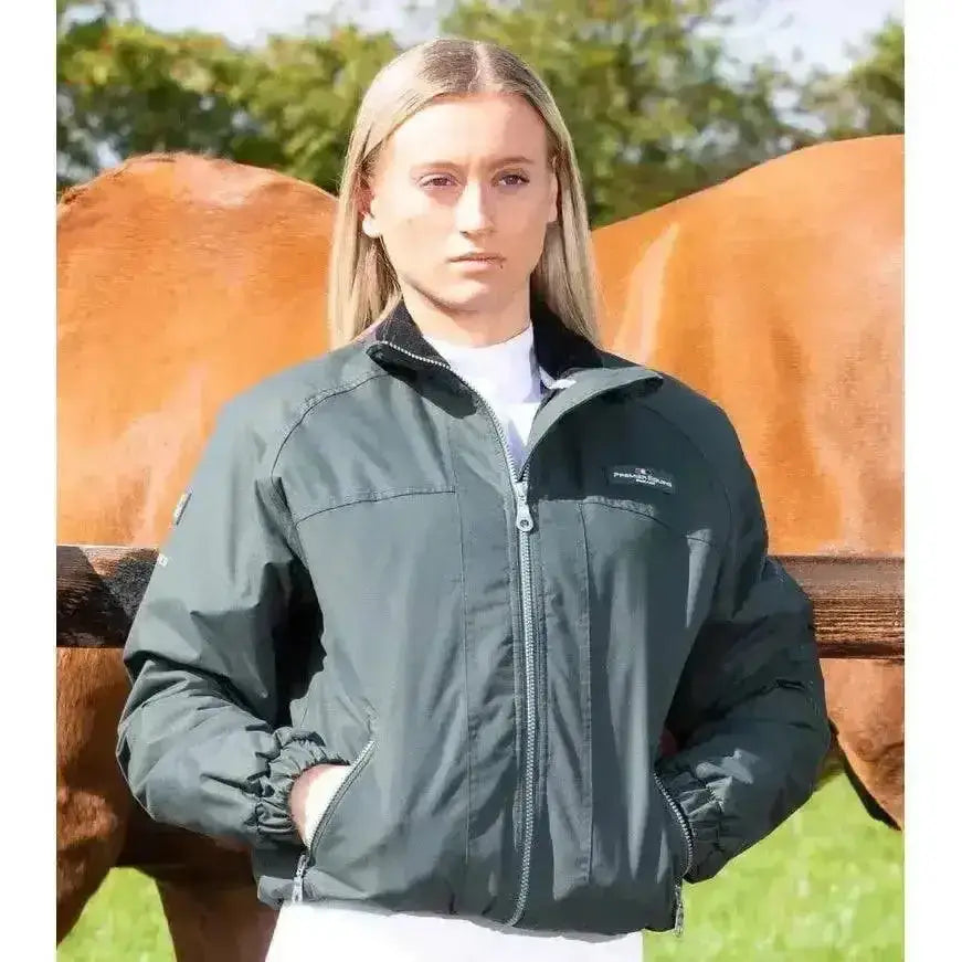 Dark green waterproof riding jacket with black collar and zipper from premier equine pro rider unisex collection