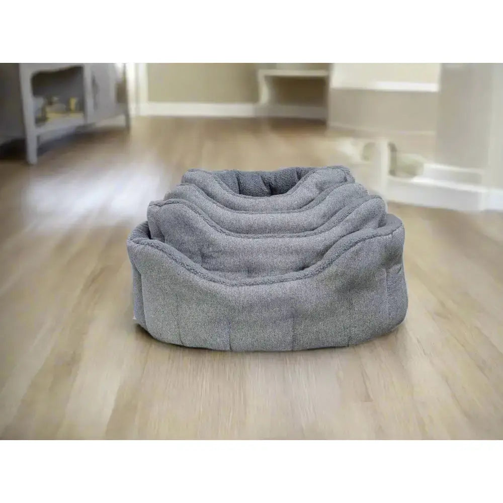 Gray plush multi-tiered lined bolster bed with orkney tweed fleece and soft sherpa fleece lining for pets