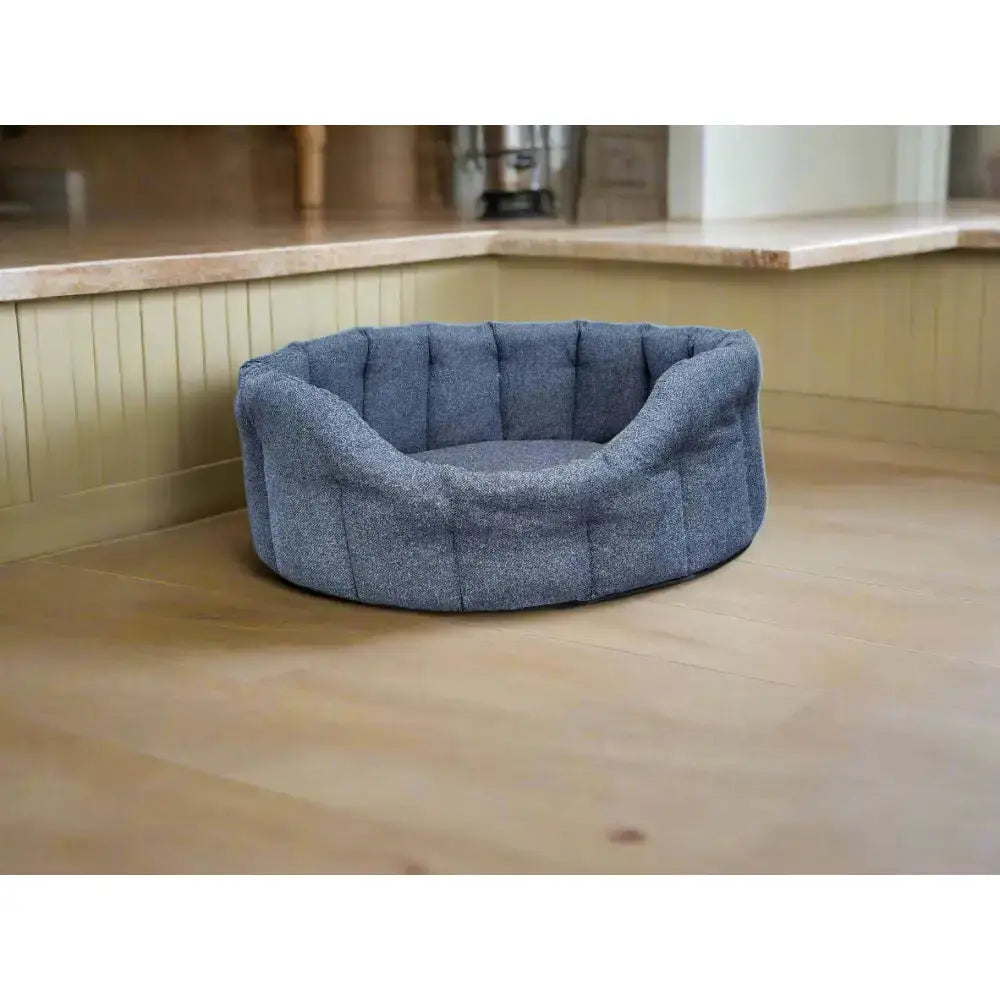 Blue tufted fabric premium orkney tweed oval bed with cozy rounded design and 7cm base for comfy pets