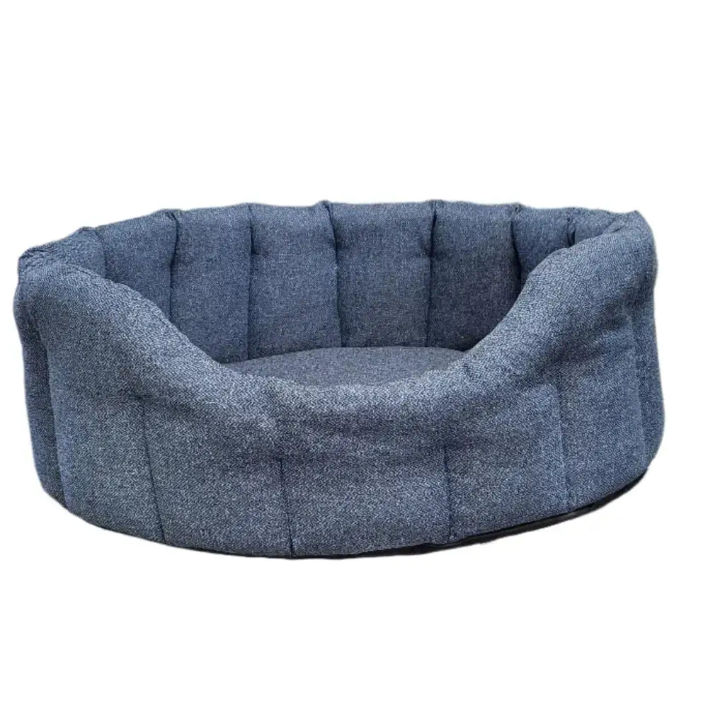 Blue textured premium orkney tweed oval beds with cushioned rounded design and a 7cm base for cozy pets