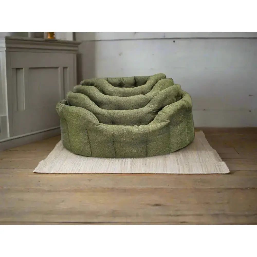 Olive green premium orkney tweed plush tweed oval bed with soft textured fabric and 7cm base for dogs