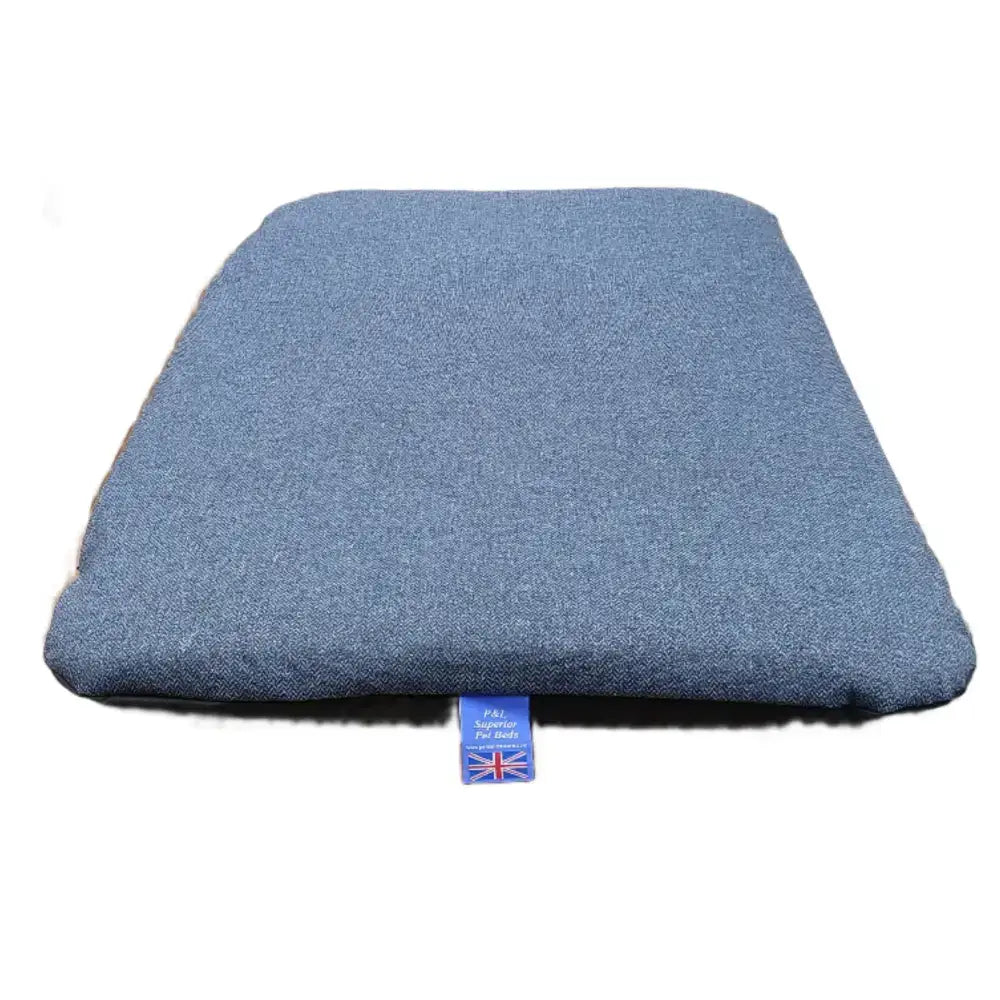 Blue textured cushion with union jack tag on premium orkney tweed removable cover duvet with waterproof base
