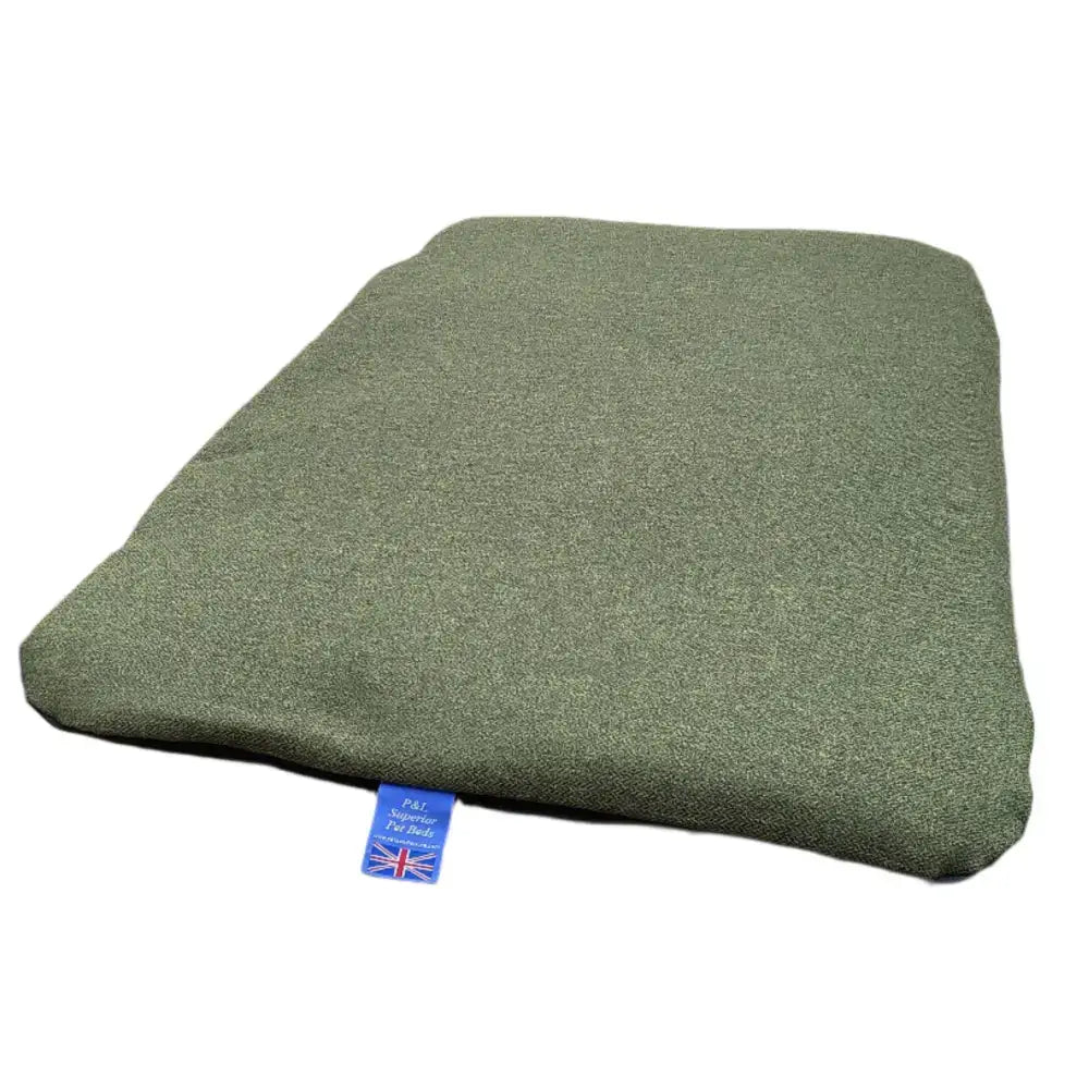 Olive green textured cushion from premium orkney tweed removable cover duvet with a small union jack tag