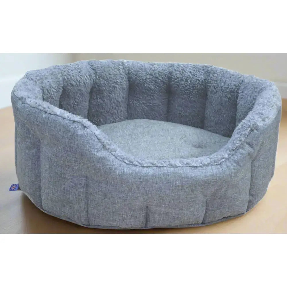 Gray plush premium oval bolster heavy duty fleece lined machine washable dog bed with soft textured fabric exterior
