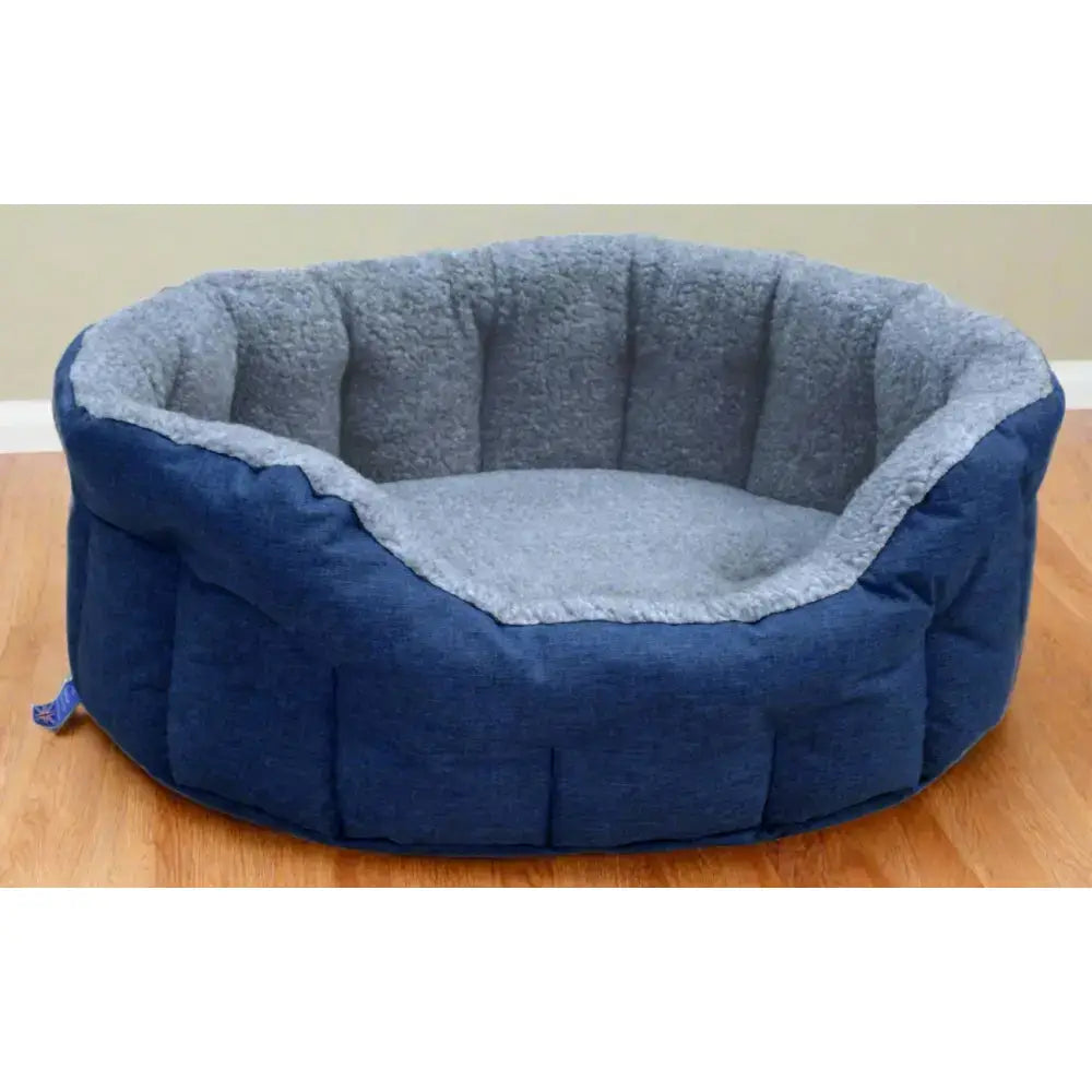 Blue and gray premium oval bolster heavy duty fleece lined machine washable dog bed with soft cushioned interior