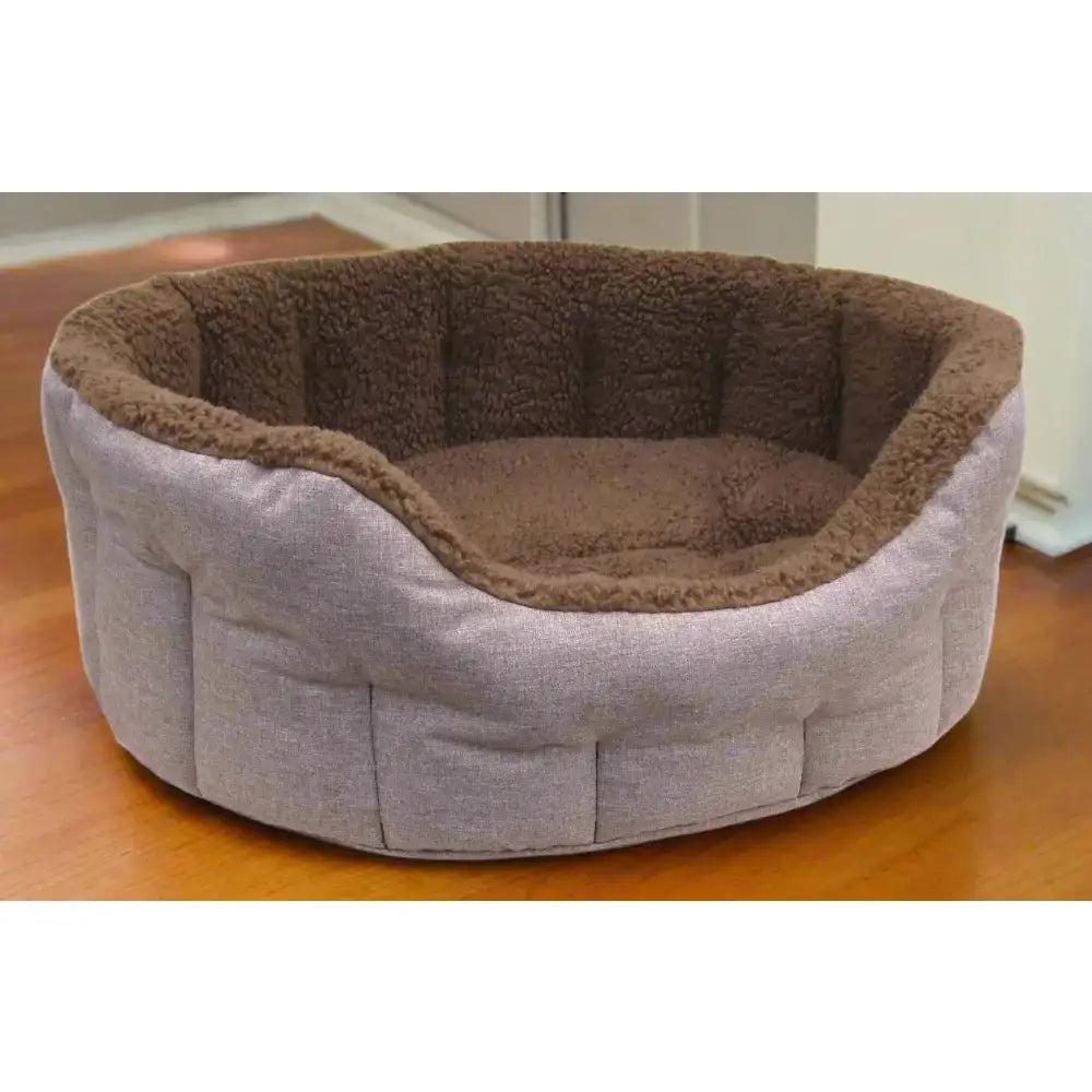 Cozy premium oval bolster machine washable dog bed with soft gray fabric and heavy duty fleece lining