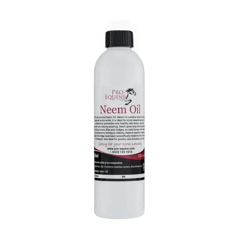 A white plastic bottle with black cap labeled pro-equine neem oil by nature’s marvels for rapid hair re-growth