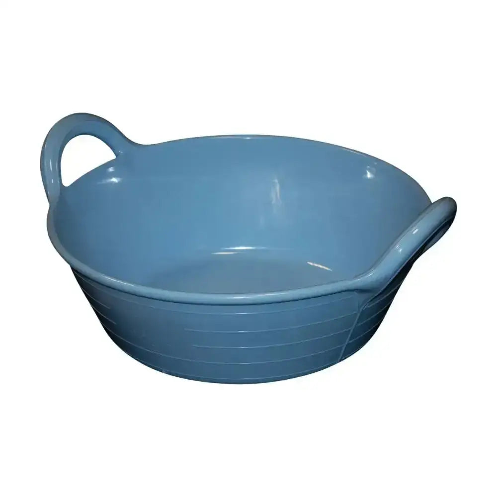 A light blue ceramic baking dish with handles and ribbed exterior beside a red gorilla plas feed small coloured feed skip