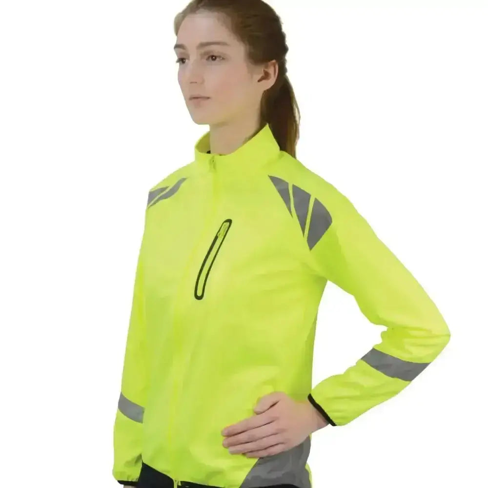 Bright neon yellow reflector jacket by hy equestrian with gray reflective stripes for visibility in darker evenings wearing