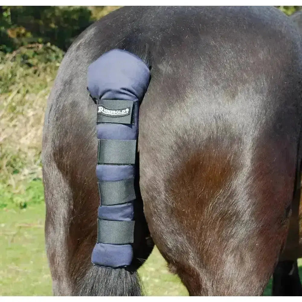 Dark blue rhinegold cotton quilted tailguard with black elastic straps and breathable padded design for horse tails