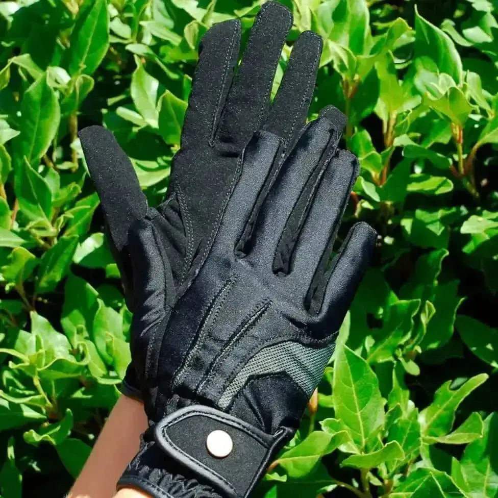 Black rhinegold elite stretch nubuck suede riding glove with reinforced stitching and adjustable strap closure shown from back