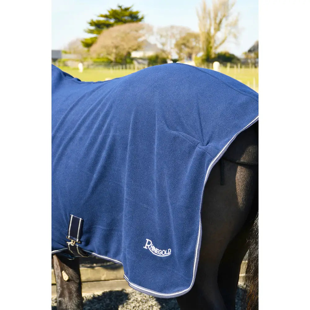 Royal blue rhinegold fleece horsewalker rug with white trim and embroidered logo handy horse rug for comfort