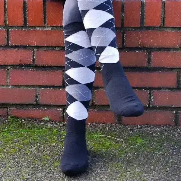 Black and white argyle patterned rhinegold fully cushioned sole riding socks with a diamond design