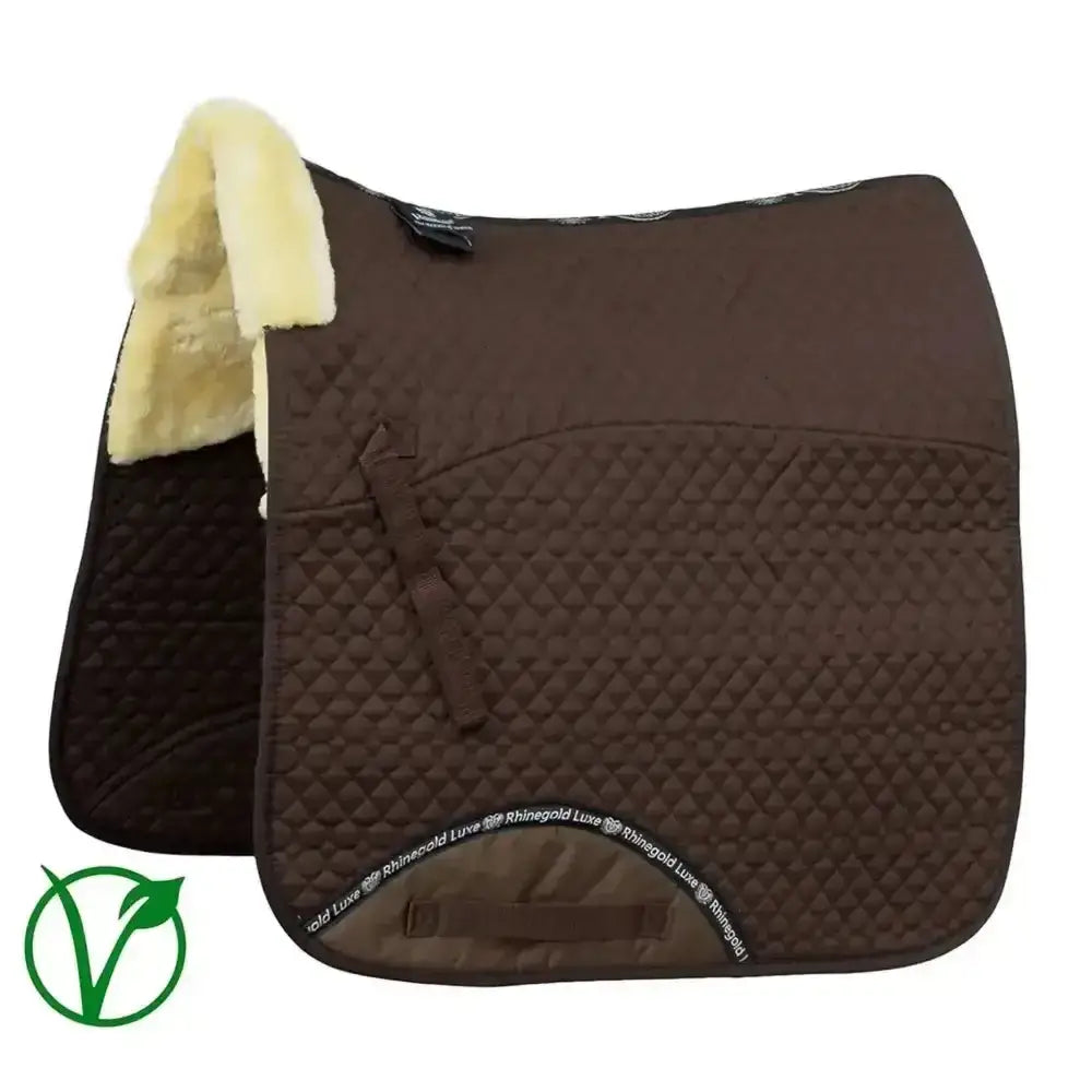 Brown quilted rhinegold luxe fur dressage saddle cloth with cream fleece lining and rhinegold luxe branding
