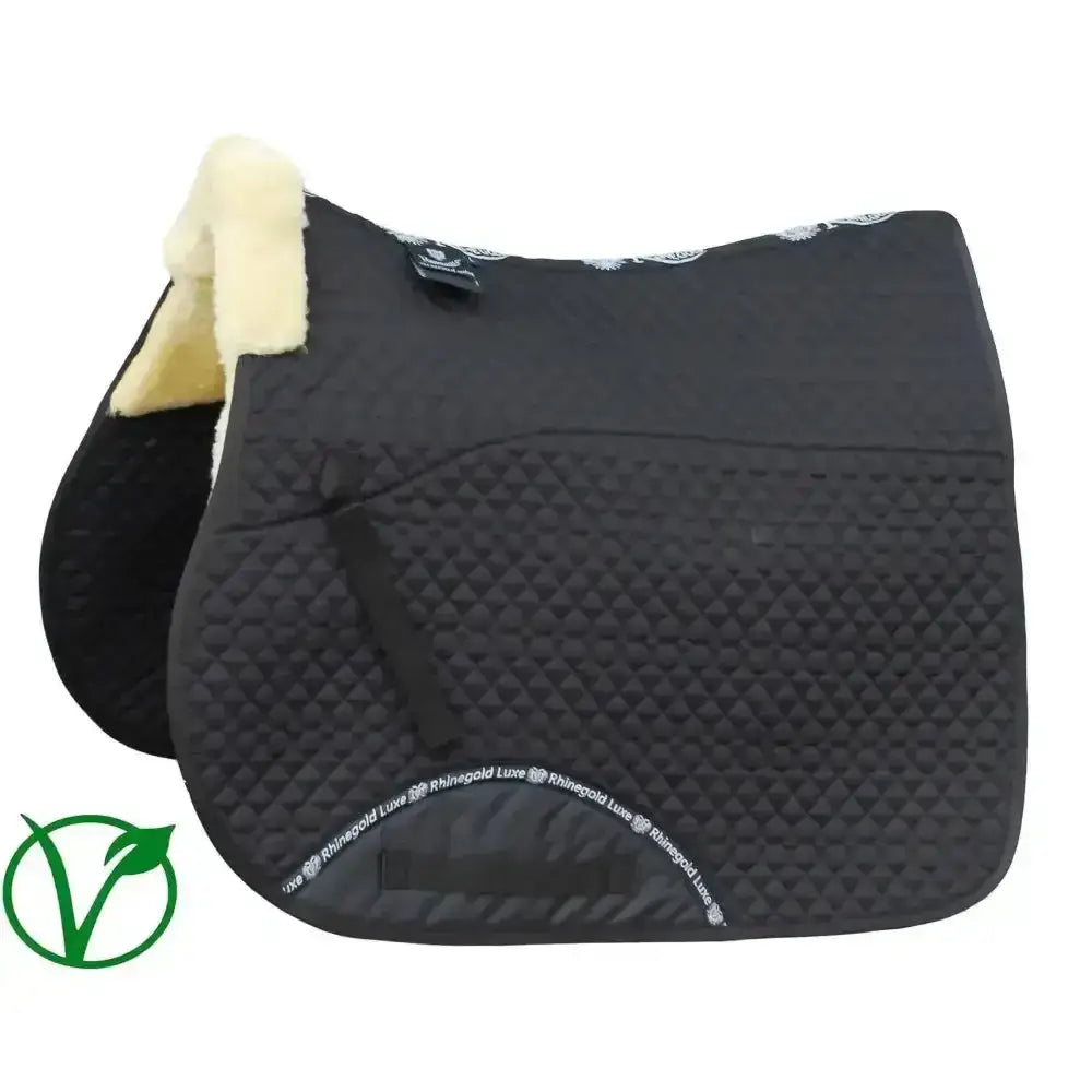 Black rhinegold luxe fur lined saddle cloth with quilted diamond pattern and cream faux fur edges