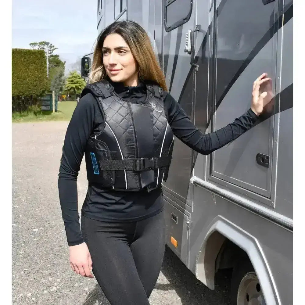 Black quilted rhinegold prestige zip body protector beta level 3 with white piping and adjustable straps for adults