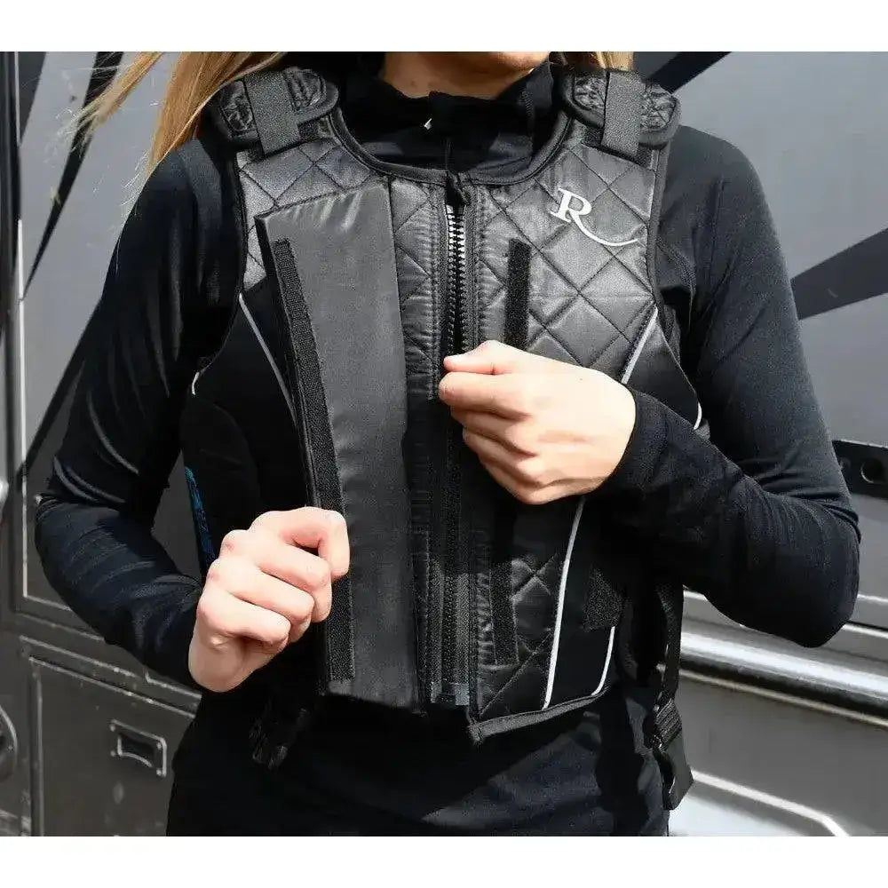 Black quilted rhinegold prestige zip adult body protector beta level 3 with silver zipper and white stitching details