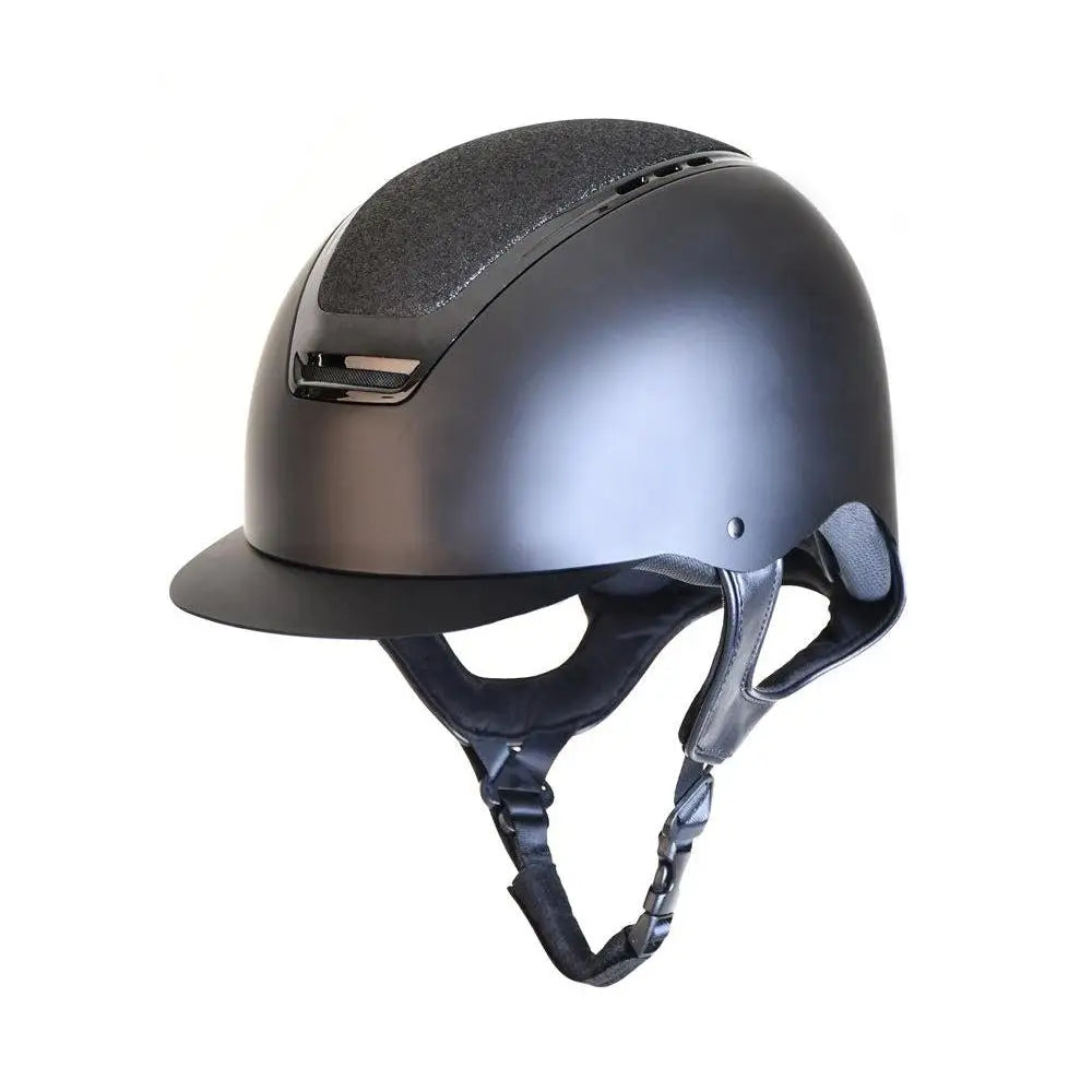 Matte black rhinegold pro carbon riding helmet with textured ventilation panel and adjustable chin strap for riders