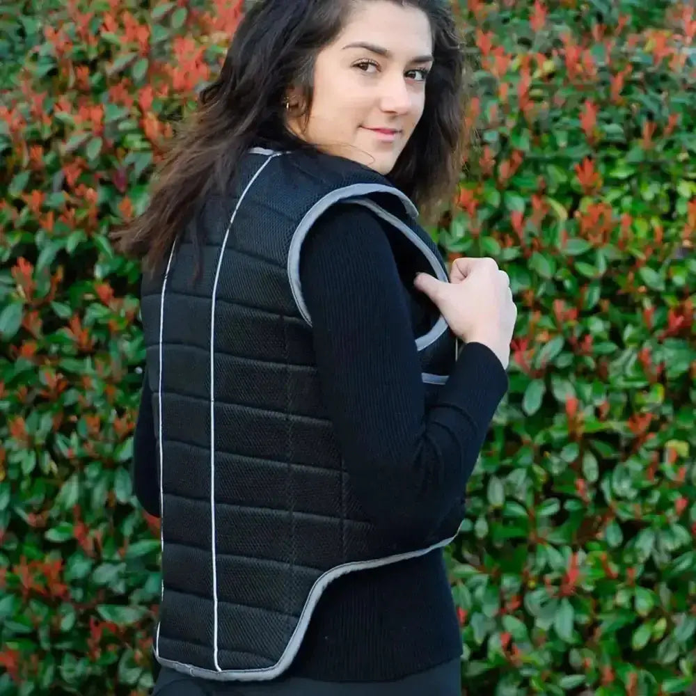 Black quilted rhinegold pro-comfort adult body protector beta with gray trim and white stitching for safety gear