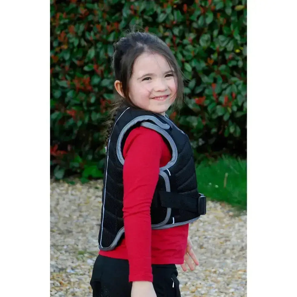 Black and gray padded rhinegold pro comfort childs body protector beta with adjustable straps for safety and comfort