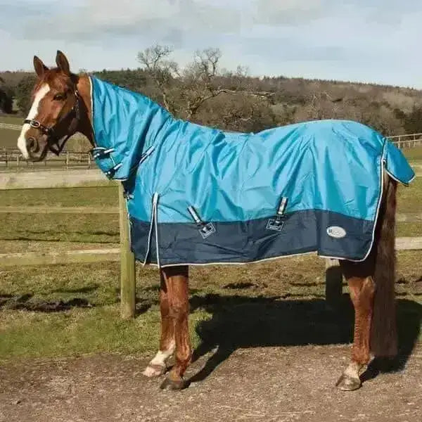 A blue and navy rhinegold torrent lightweight horse blanket with a hood reflective buckles and logo patch waterproof breathable outer layer