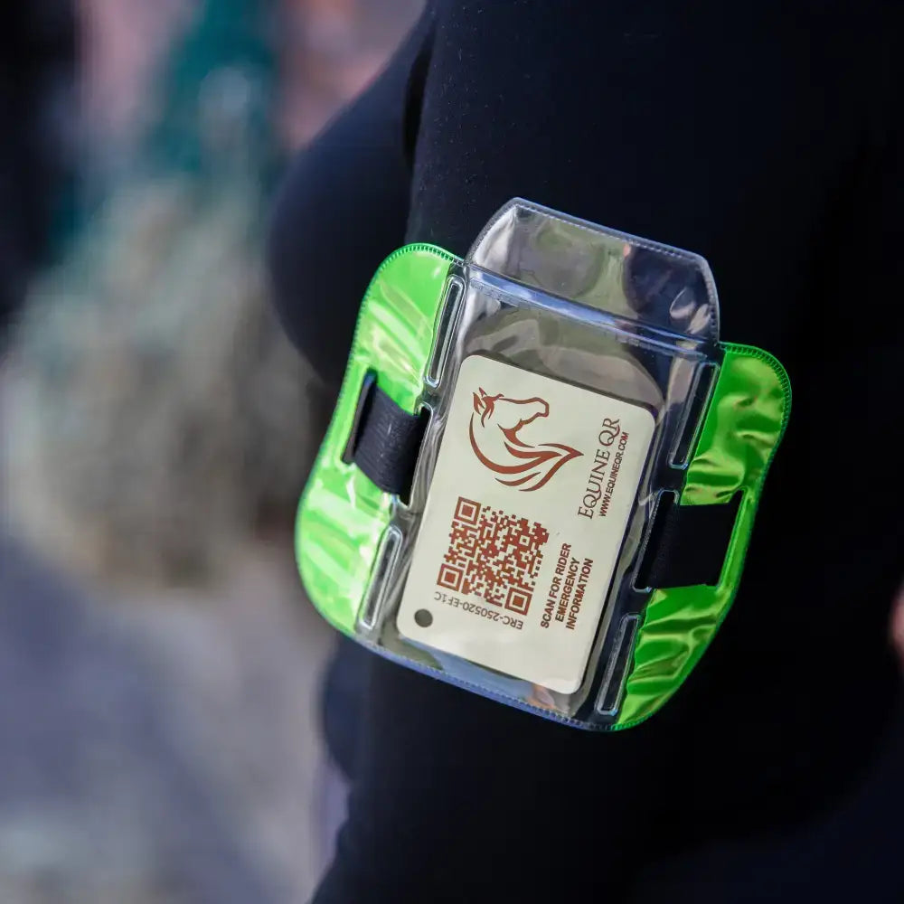 Bright green reflective rider emergency tag with clear plastic pocket for emergency contacts and medical details card