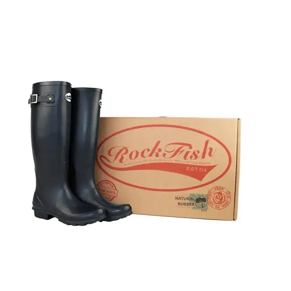Black rockfish women’s tall standard matt wellington boots with silver buckle and logo beside branded box