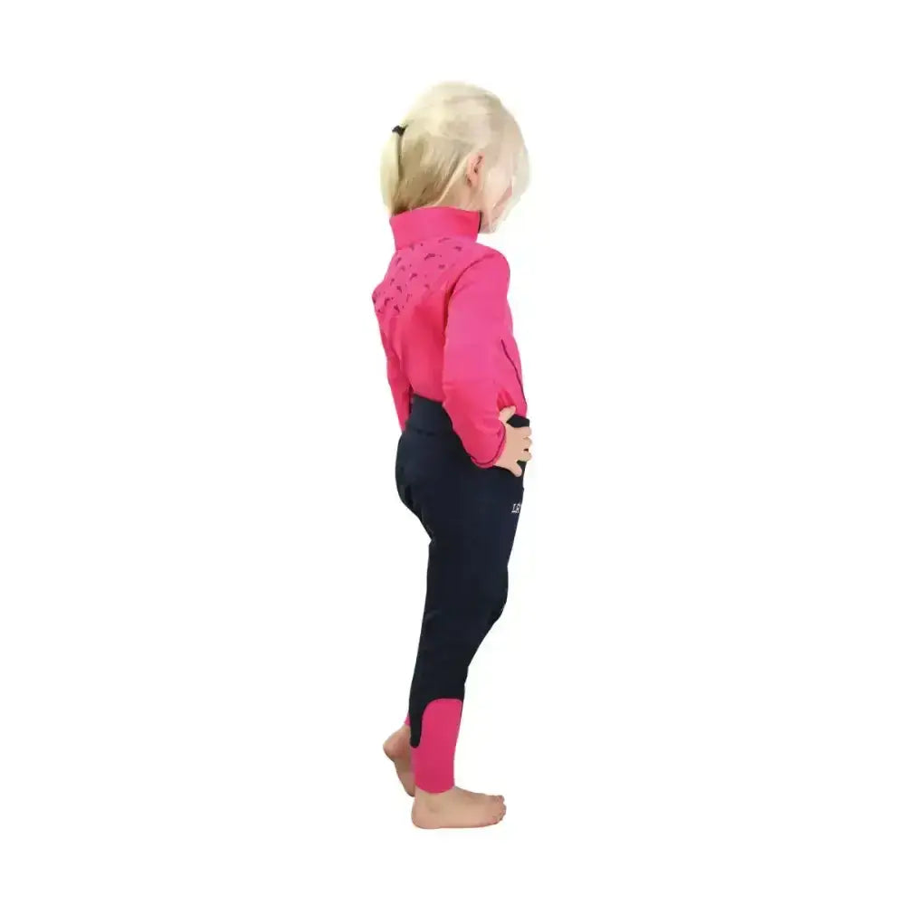 Pink and black sara base layer equestrian pants with high waist and contrasting ankle panels perfect for child’s wardrobe base layers