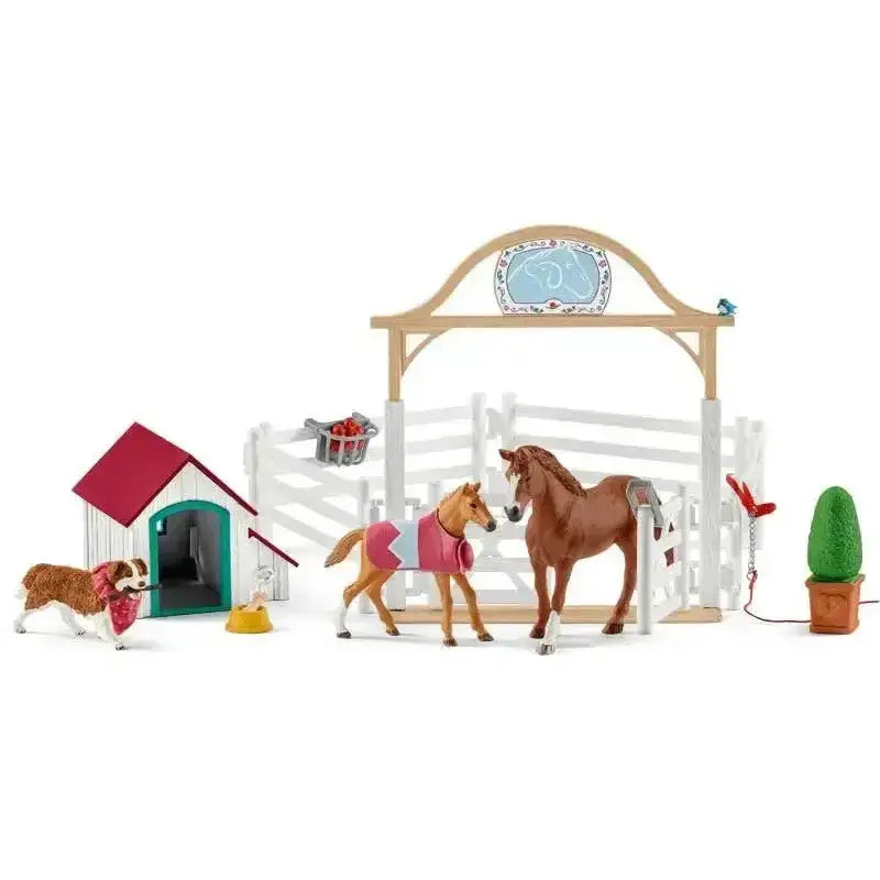 Schleich horse club hannahs guest horses playset with brown horse and foal in pink blankets and ruby the dog near red stable