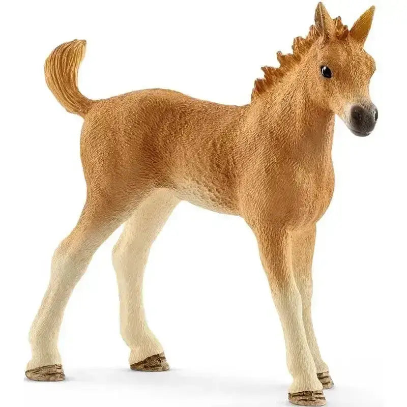 Detailed plastic light brown foal with white legs and textured fur from schleich horse club sarahs baby animal care