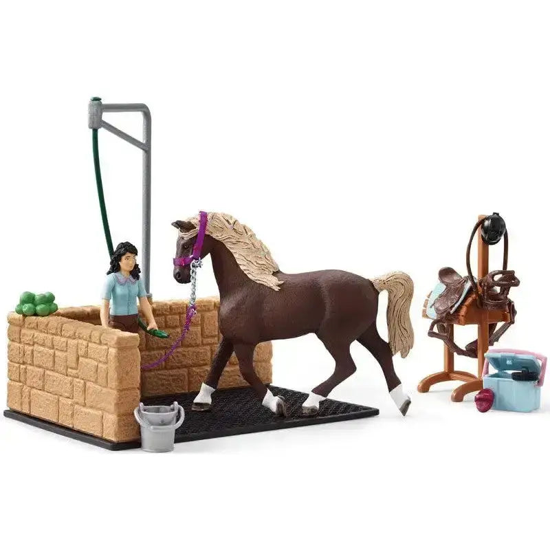 Brown plastic horse with blonde mane wearing purple halter in schleich washing area with horse club emily set