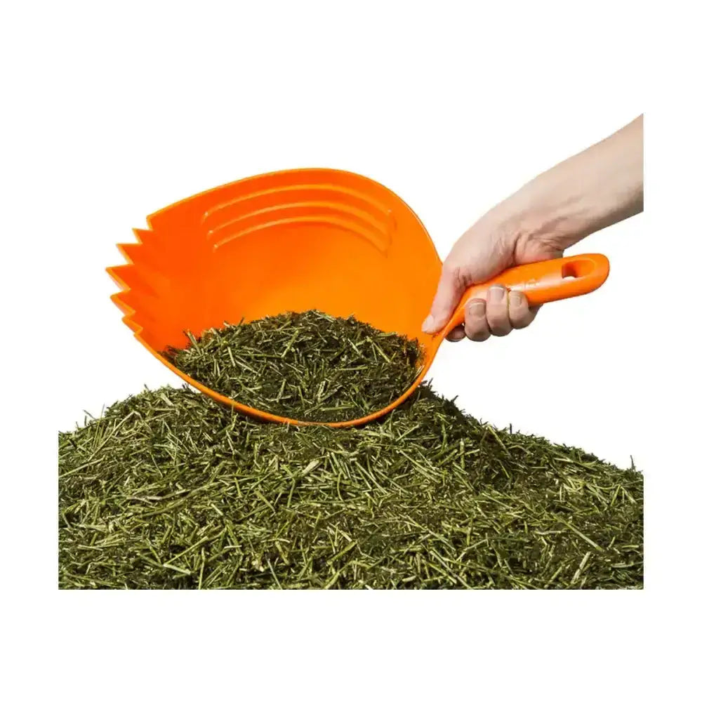 Bright orange plastic shark skup scoop with serrated edge and ergonomic handle designed feed scoop for loosening compacted feed