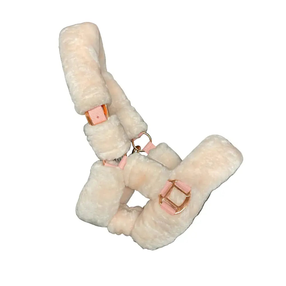 Cream-colored sheldon elano fluffy head collar with rose gold buckles and pink leather accents in faux fur