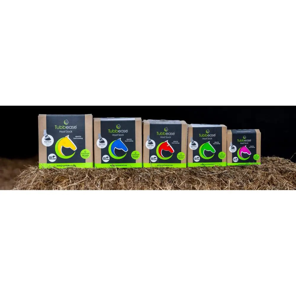 Five colorful shoof tubbease hoof socks with horse head design displayed on straw for hoof problems care