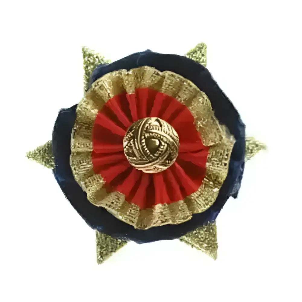 A showquest buttonholes newport star-shaped layer rosette pin with navy velvet red gold fabric and ornate gold center