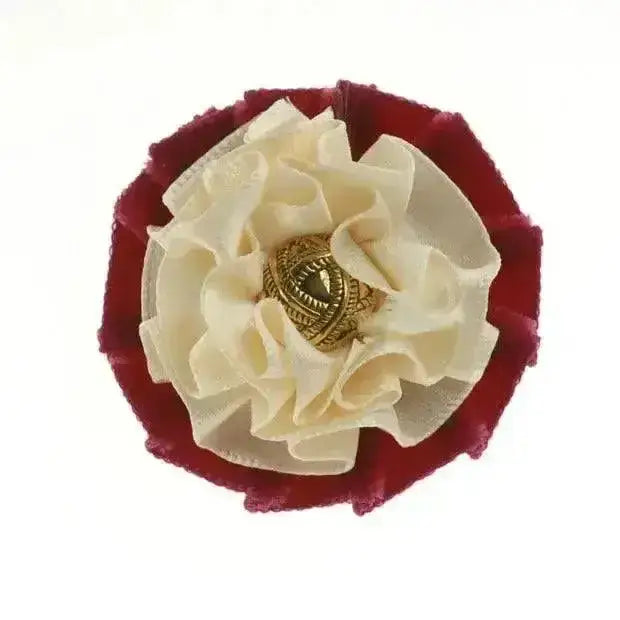 Cream-colored ruffled fabric flower with gold center and deep red velvet border in showquest newport buttonhole style