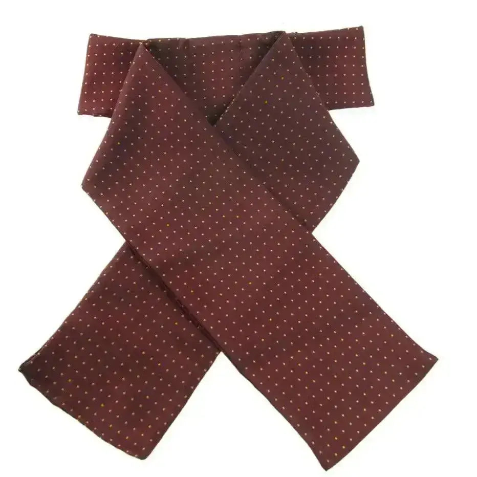 A maroon silk showquest pin spot ready-tied stock with subtle white polka dots perfect for shows