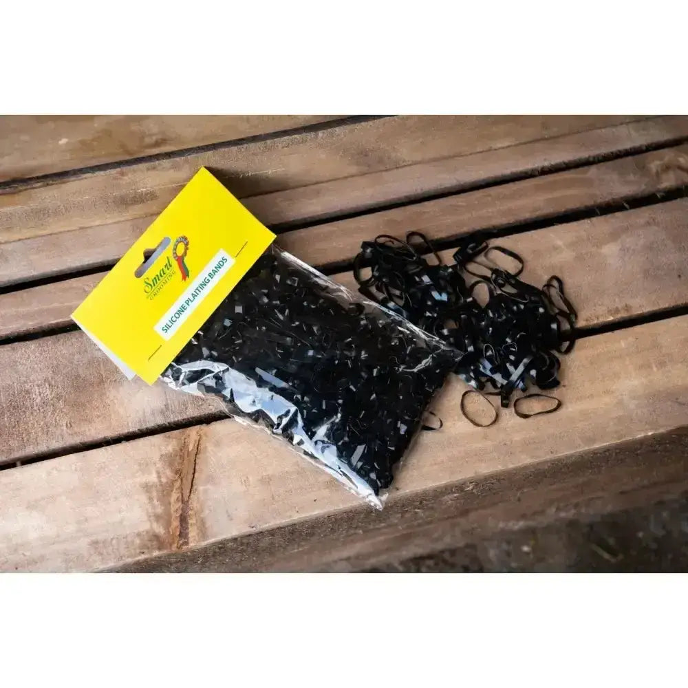 Black silicone plaiting bands pack of 500 in clear plastic packaging with yellow label ultra stretchy braiding bands