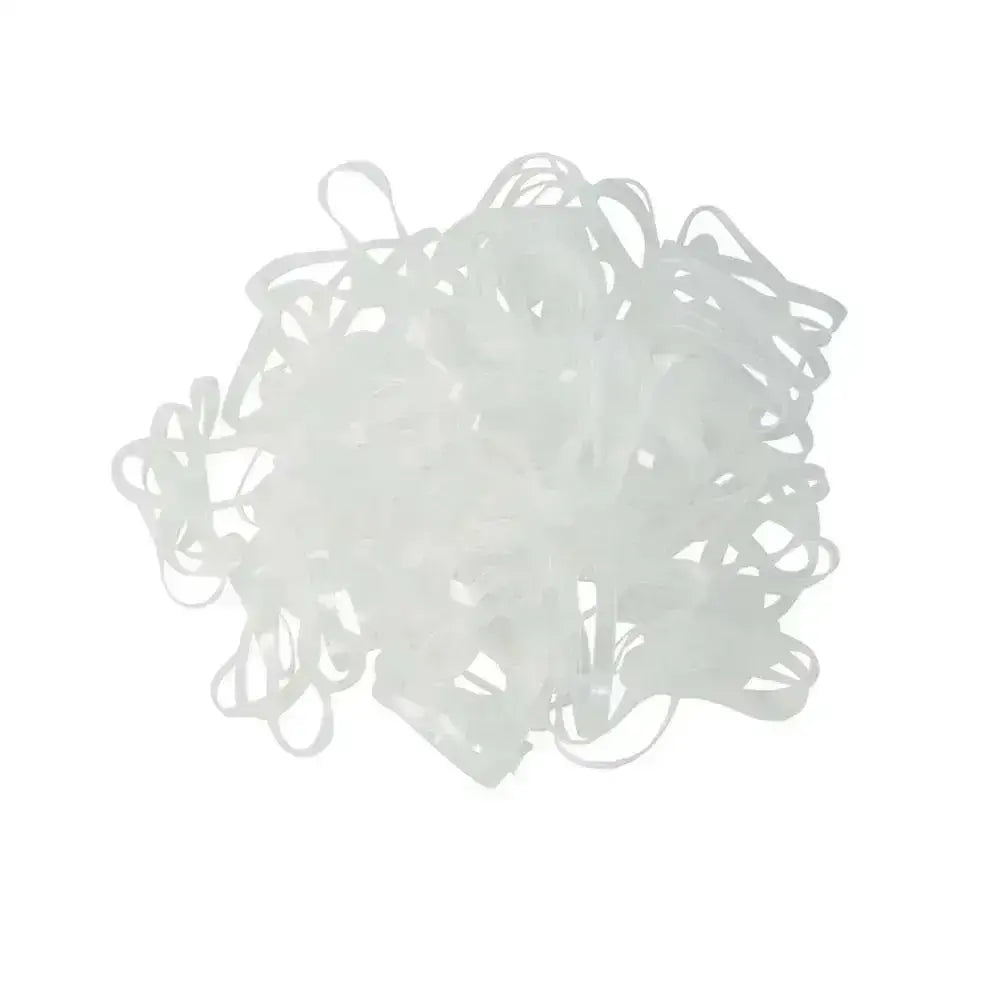 A tangled pile of translucent white silicone plaiting bands perfect for easy plaiting in plaiting bands packs